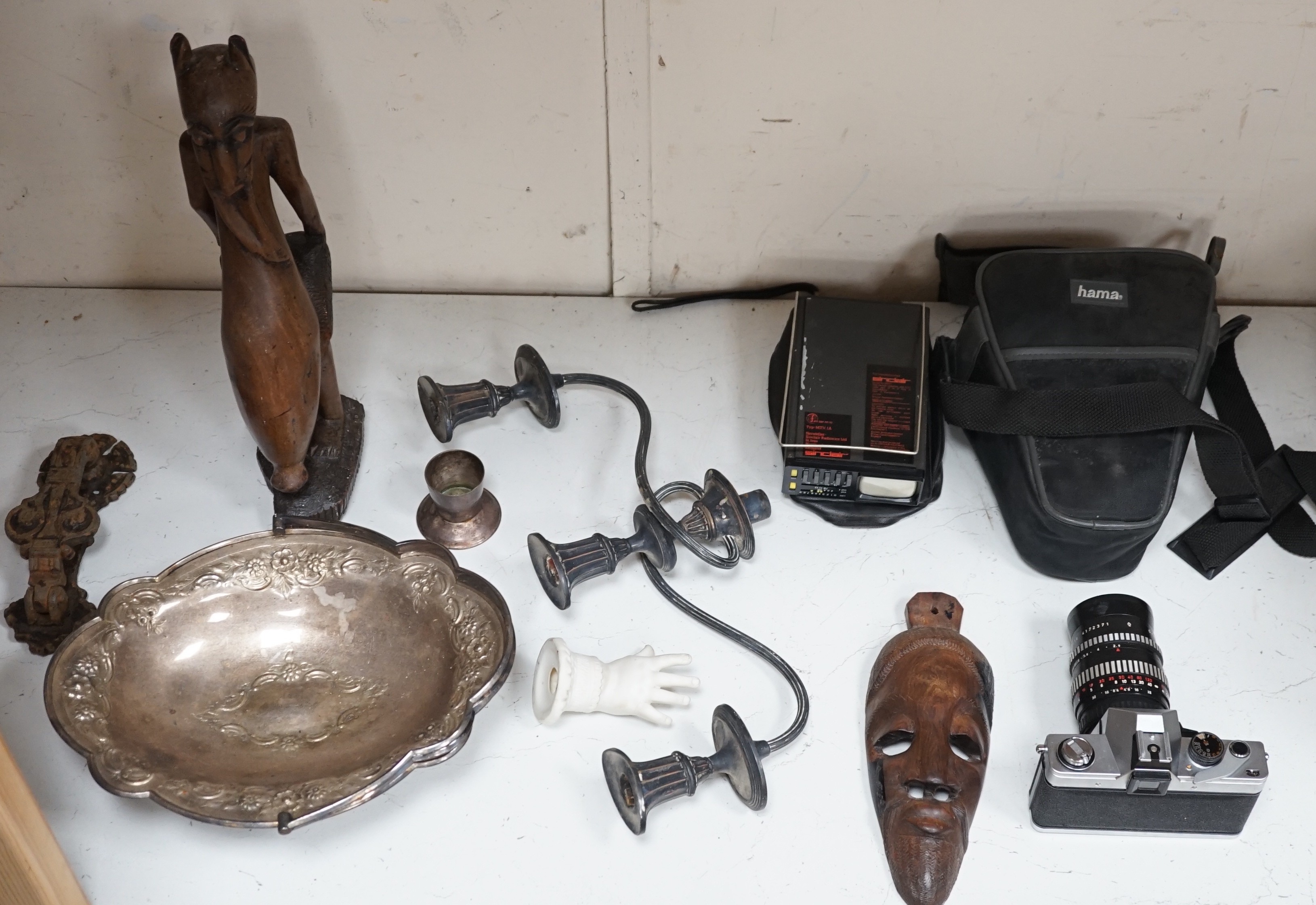 A Sinclair Micro Vision portable television, a Praktica SLR camera, etc.